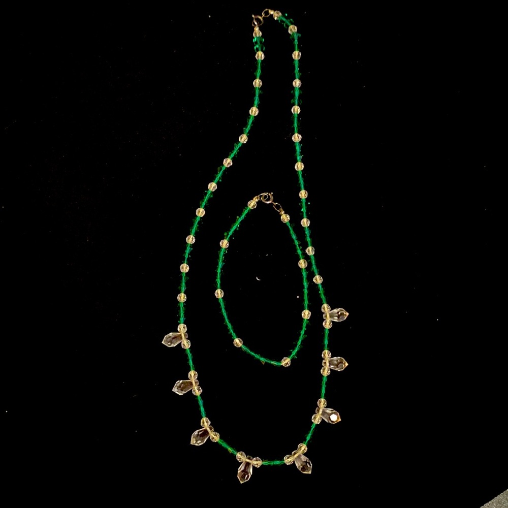Dainty shiny green and clear beaded necklace matching bracelet